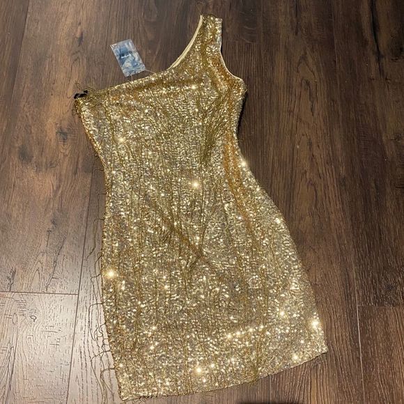 bebe Dresses & Skirts - bebe BRAND NEW Gold Fringe One-Shoulder Dress